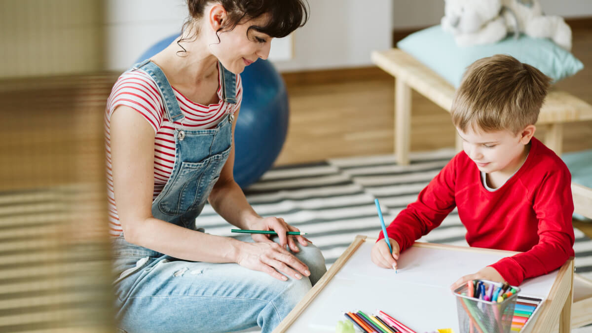 Woman-observing-child