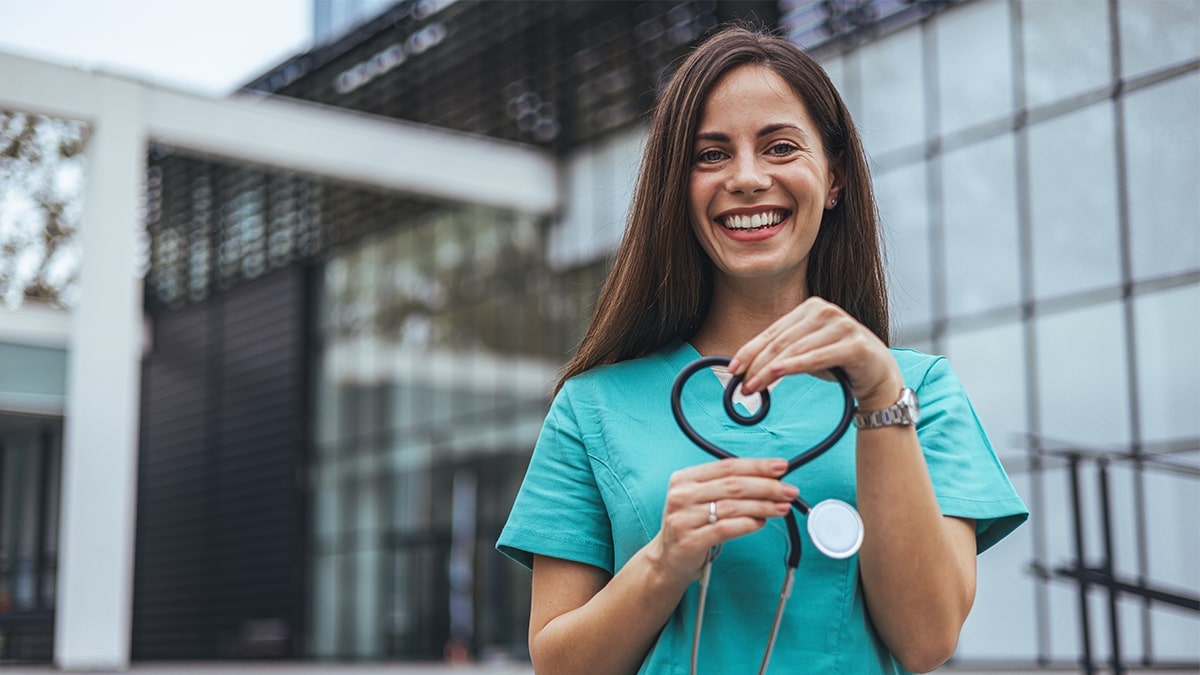 Doctor making a heart shape with a stethoscope