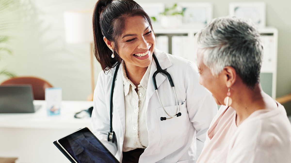 Doctor smiling at patient