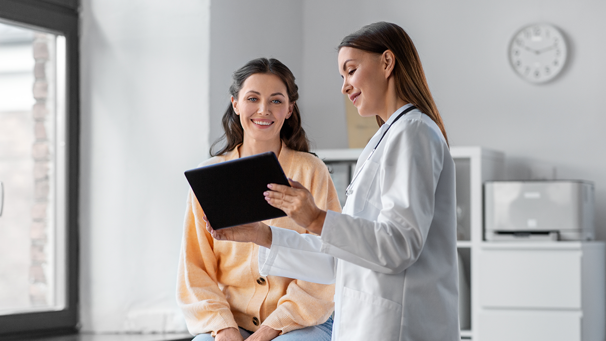 Patient smiling at doctors results